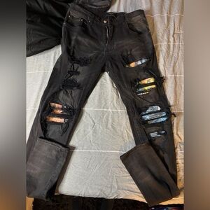 AMIRI Black Hawaiian patch distressed jean